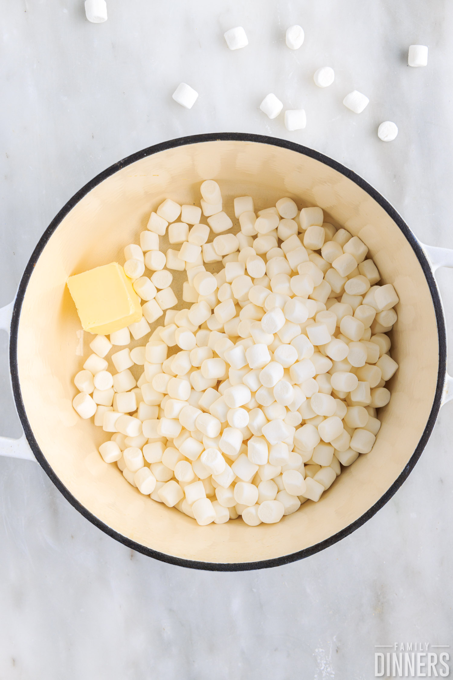 butter and marshmallows getting ready to melt in a pot