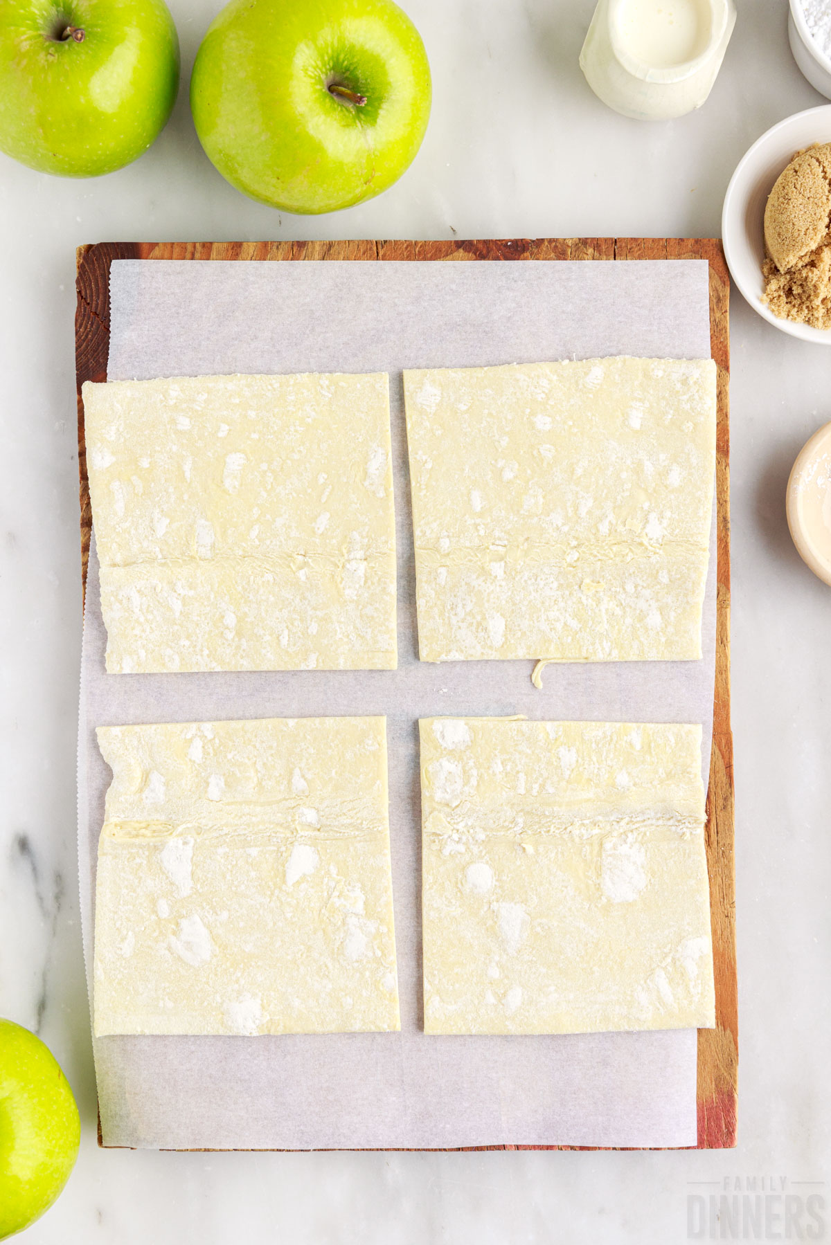 puff pastry squares on parchment paper