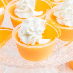 orange jello shots with whipped cream