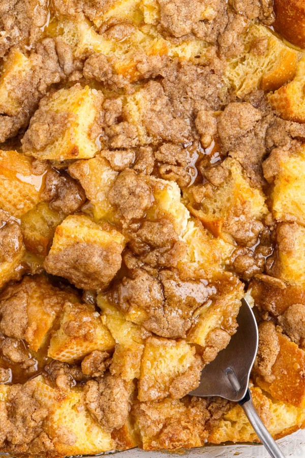 baked French toast casserole with a spoon in it