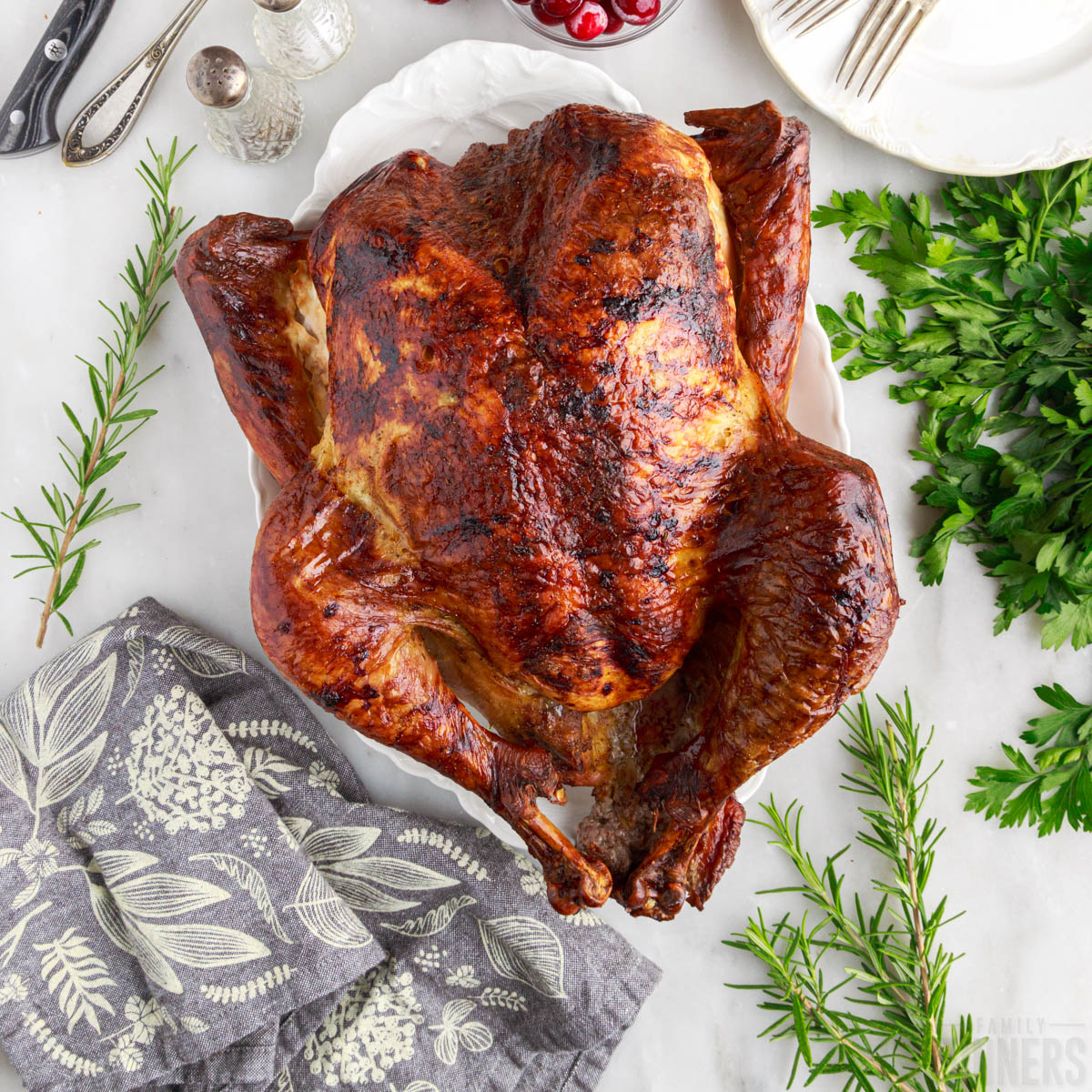 roast turkey on a serving platter on a table
