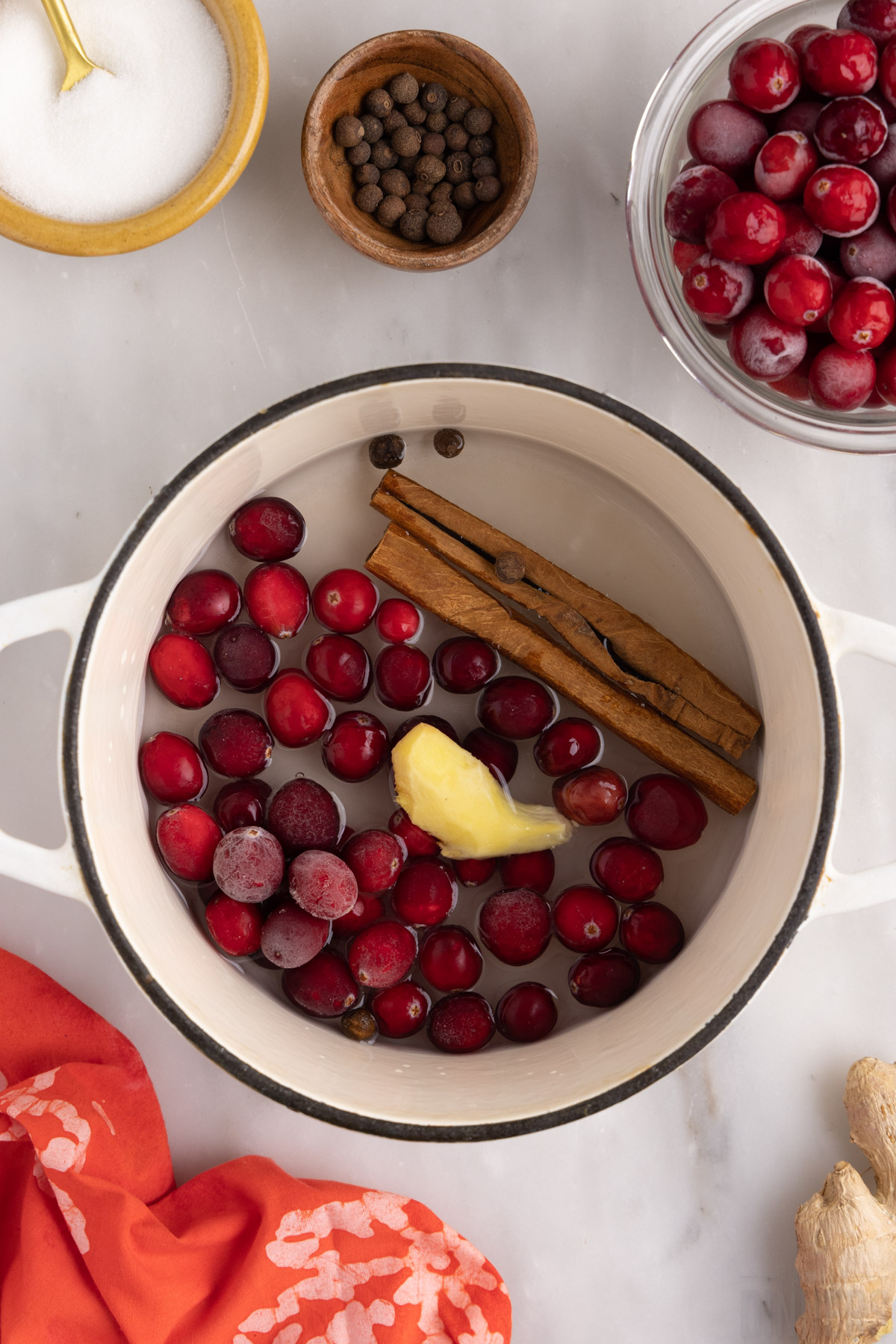 cranberry simple syrup ingredients in a pot