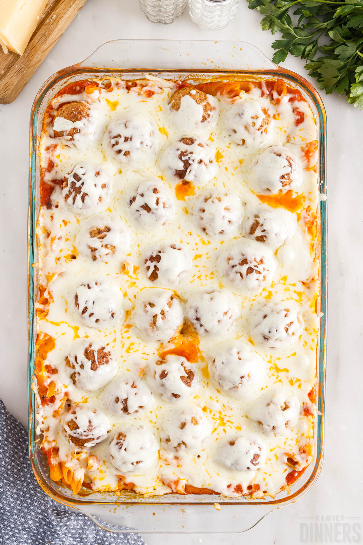 melted cheese on top of meatball casserole