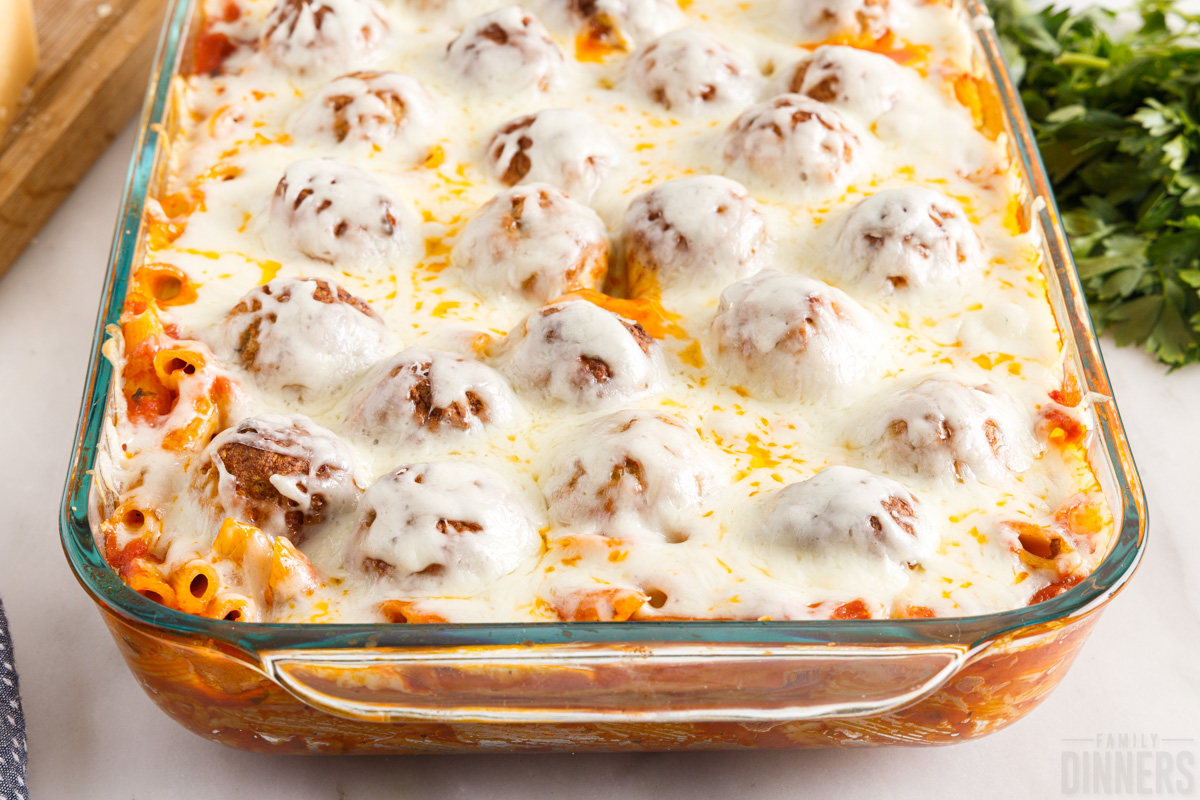 pasta bake with meatballs in a casserole dish