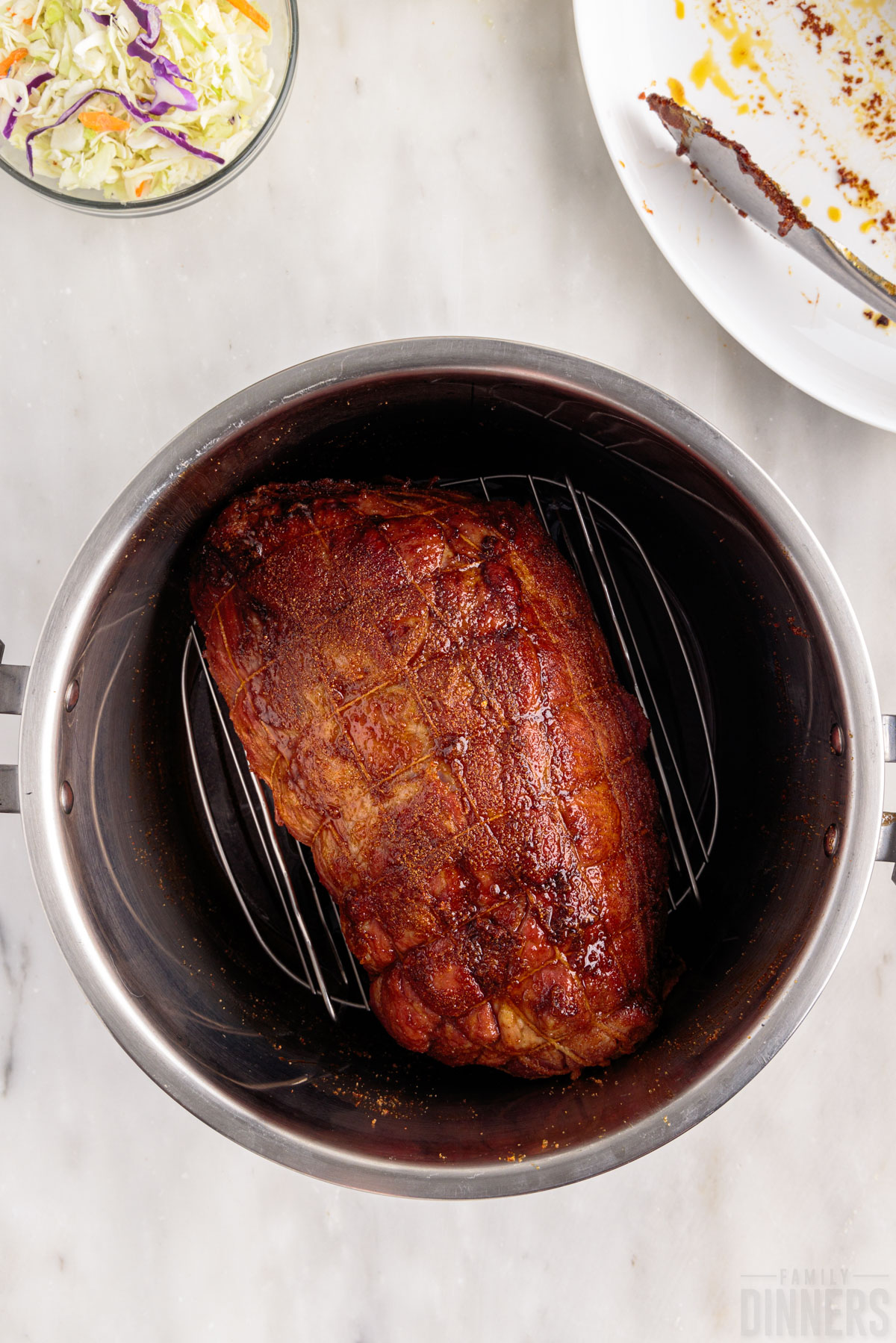 pork roast on a metal trivet in the instant pot