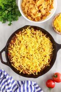 beef mixture topped with shredded cheddar cheese