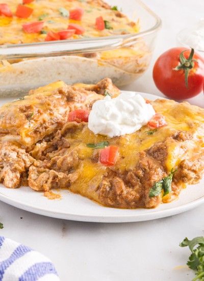 Mexican casserole recipe with ground beef on a plate.
