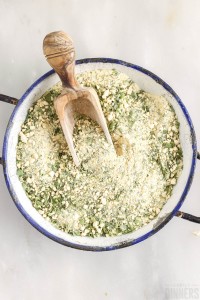 mixed up ranch seasoning in a pot with a wooden spoon
