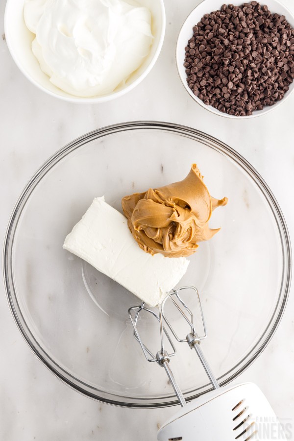 cream cheese and peanut butter in a mixing bowl